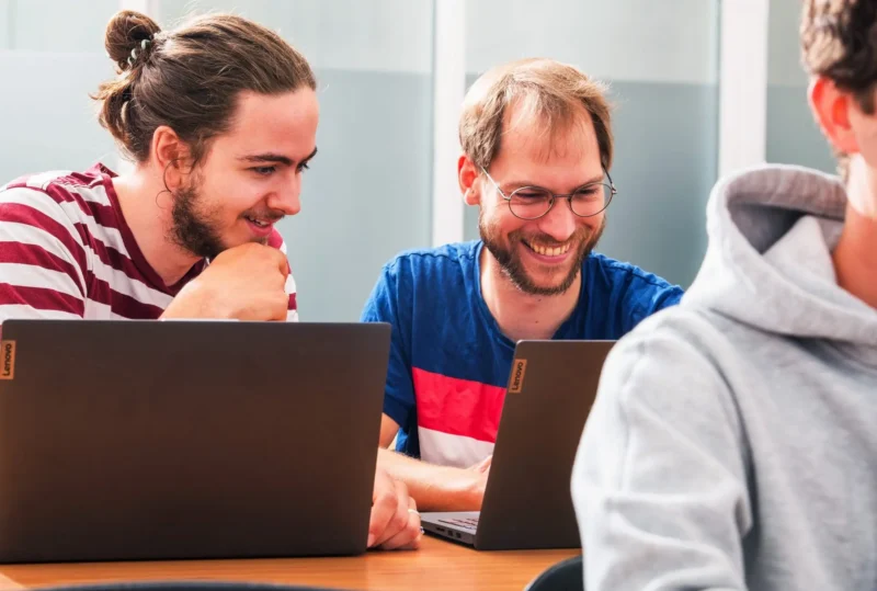 Two students at a laptop during Geo-ICT class