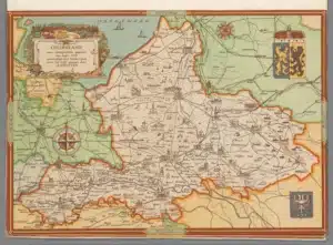 Een historische kaart van Gelderland uit 1940, vervaardigd door Studio Certo, met daarop afgebeeld de regio's en belangrijke steden van Gelderland. De kaart toont gedetailleerde illustraties van gebouwen, kastelen, rivieren en wegen, en is omlijnd met kleurrijke grenzen. Linksboven is een kompasroos afgebeeld en rechtsboven is het wapen van Gelderland te zien.